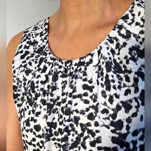 Black and white blouse size L
